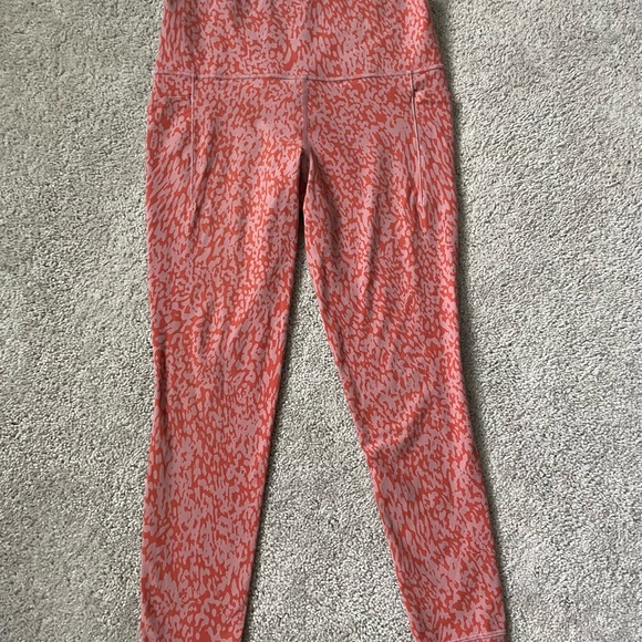 Athleta Salutation Stash Pocket Jewel Orange Leopard Print Leggings Size Medium - Picture 4 of 5